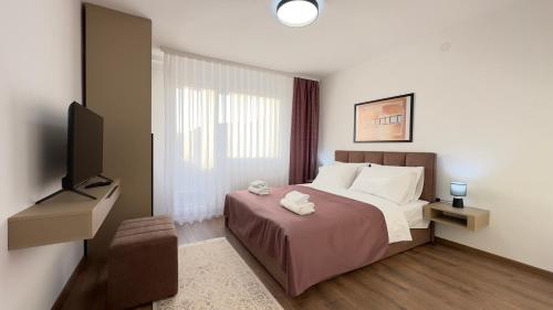 Ένα ή περισσότερα κρεβάτια σε δωμάτιο στο Kula apartman - Novi Pazar