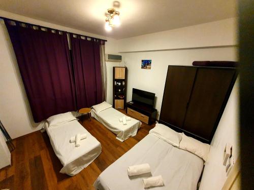 Postel nebo postele na pokoji v ubytování Ultracentral Cozy Apartment near Old Town