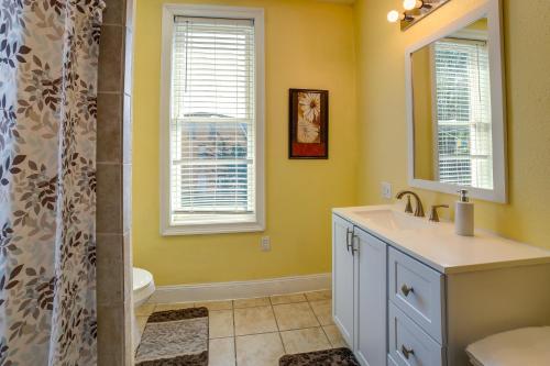 a bathroom with a sink and a shower at Inviting Connellsville Getaway with Deck! in Connellsville