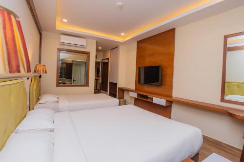 TV a/nebo společenská místnost v ubytování Hotel Fewa Trip