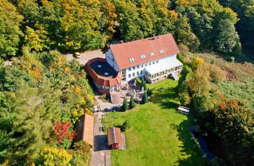 an aerial view of a large building with a yard at Hotel Harzresidenz in Thale
