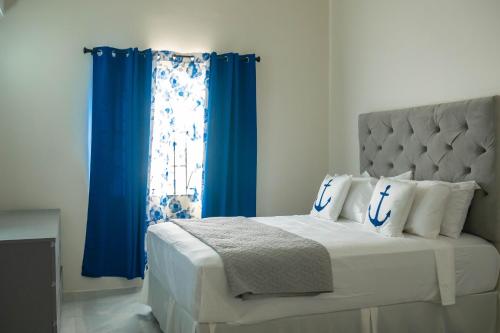 Postel nebo postele na pokoji v ubytování El Casa Azul