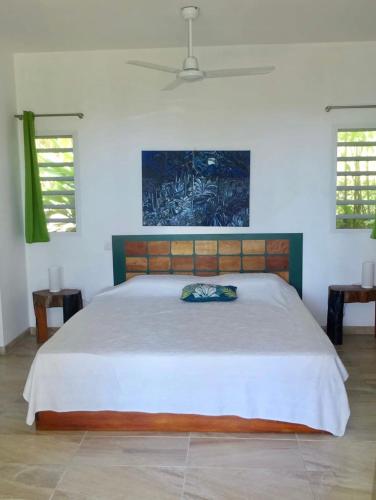 Ένα ή περισσότερα κρεβάτια σε δωμάτιο στο Bungalow DOUROU