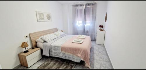 A bed or beds in a room at Apartamento Casa Tambo, Campelo