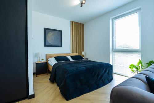 Postel nebo postele na pokoji v ubytování Vip Apartamenty