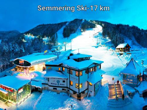 a ski resort in the snow at night at Ferienwohnung "Wohnung in Haus" in Neunkirchen