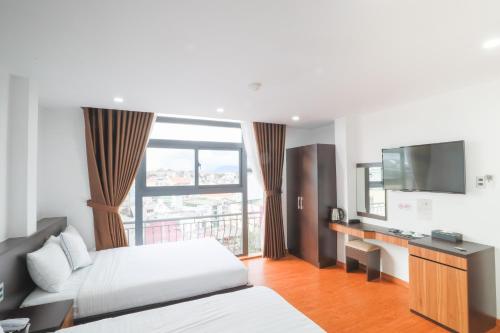 TV/trung tâm giải trí tại TTR Midtown View Hotel