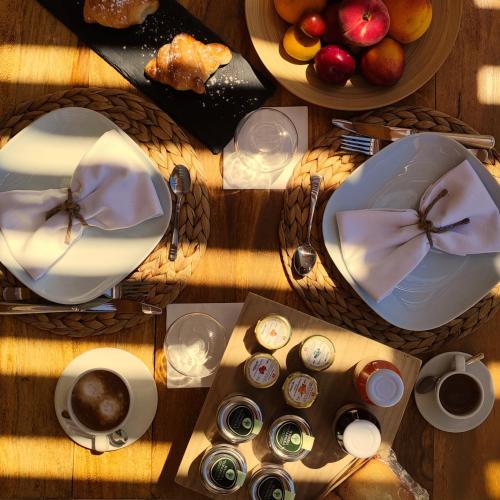 a overhead view of a table with plates of food at PALAZZO CAVÌ in Mola di Bari