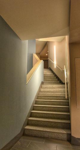 a set of stairs in a building at Bloom Apartment in Pero