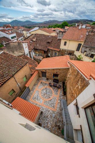 an aerial view of a town with roofs at AT la abuela Antonia- Ca Pablo in Torre de Don Miguel