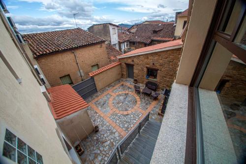 an overhead view of a balcony of a building at AT la Abuela Antonia-El Gurugú in Torre de Don Miguel