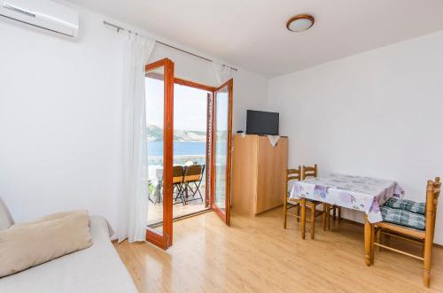 TV a/nebo společenská místnost v ubytování Apartments Seafront Jadranka