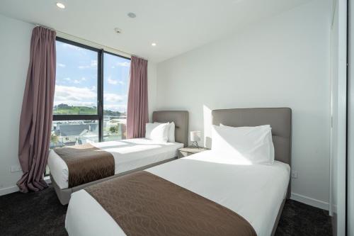 Voodi või voodid majutusasutuse The Edgerley Suites toas