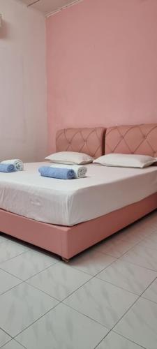 Postel nebo postele na pokoji v ubytování My Homestay Tronoh Seri Iskandar