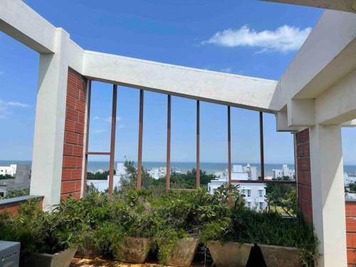 a view of the ocean from a building at Ranga Vila’s on ECR in Chennai
