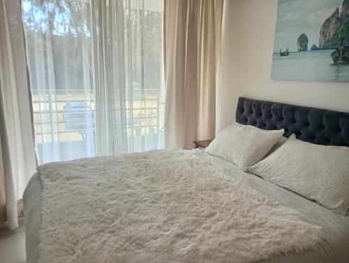 Ένα ή περισσότερα κρεβάτια σε δωμάτιο στο Costa Algarrobo Norte