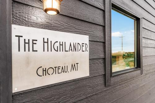 a sign on the side of a building at Modern Tiny Cabin, with Hot tub in Choteau MT in Choteau
