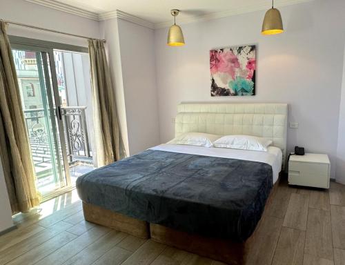 Postel nebo postele na pokoji v ubytování Sydney RiseOn Hotel