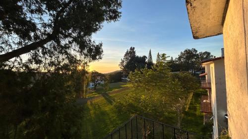 a view of the sunset from the balcony of a house at Villas de la Montaña in Taxco de Alarcón