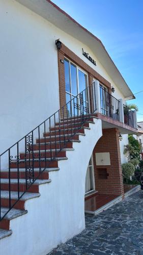a staircase on the side of a building at Villas de la Montaña in Taxco de Alarcón
