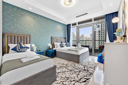 a bedroom with two beds and a large window at FULL Burj Khalifa view LUX 2Bedroom with Rooftop Pool Central location in Paramount Hotel Midtown in Dubai