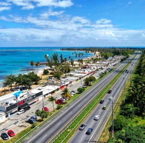 an aerial view of a road near the beach at Oceanfront Retreat in Playa Fortuna, Puerto Rico in Luquillo