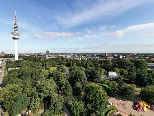 an aerial view of a city with a tower at IntercityHotel Hamburg Dammtor-Messe in Hamburg