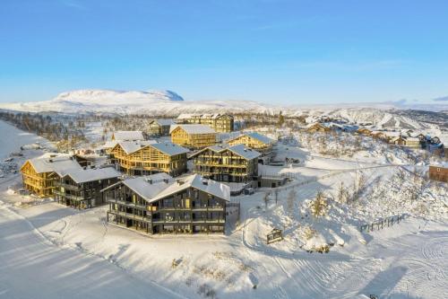 an aerial view of a resort in the snow at Kikut Alpin Lodge - Ski in, Ski out in Geilo