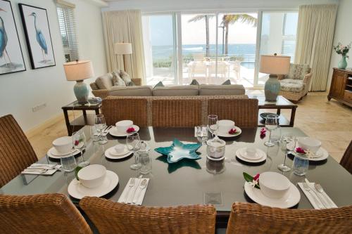 a dining room with a table with a star on it at Oceanfront 5-Stars Starfish Villa, Dawn Beach, Private Pool, Secured, Concierge in Oyster Pond