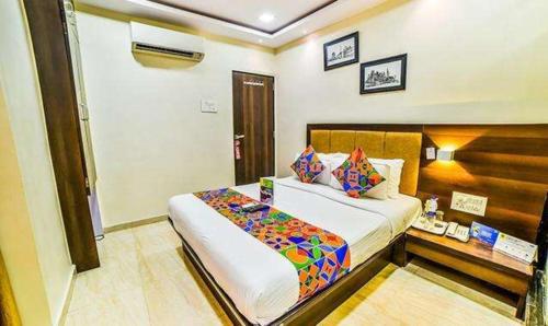 Postel nebo postele na pokoji v ubytování FabHotel Ascot International II - Nr Mumbai International Airport