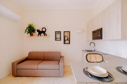 a living room with a couch and a table at Benedictine monastery of 1072 in Assisi