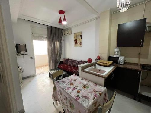 Телевизор и/или развлекательный центр в Palmeraies vacances Tunis