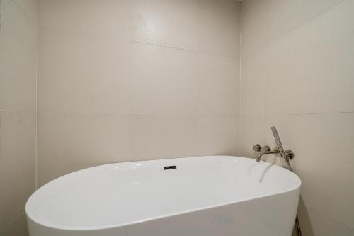 Ένα μπάνιο στο Hound Hotel Gimhae Samgye