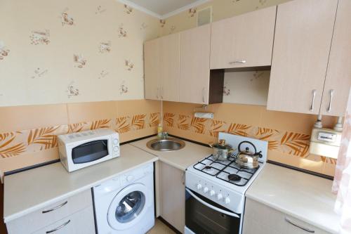 A kitchen or kitchenette at Вегас