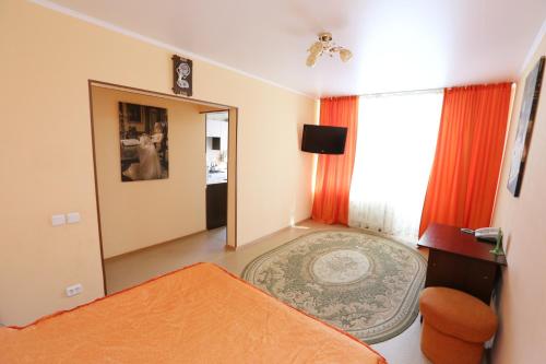 A bed or beds in a room at Вегас