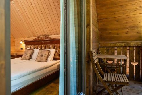 Postel nebo postele na pokoji v ubytování Pristava Lepena Village
