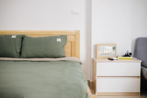 Ένα ή περισσότερα κρεβάτια σε δωμάτιο στο 9 LIGHT APARTMENT