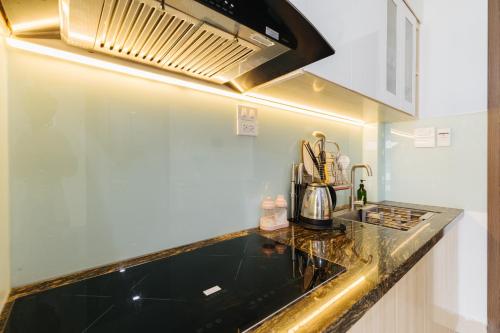 Η κουζίνα ή μικρή κουζίνα στο 9 LIGHT APARTMENT