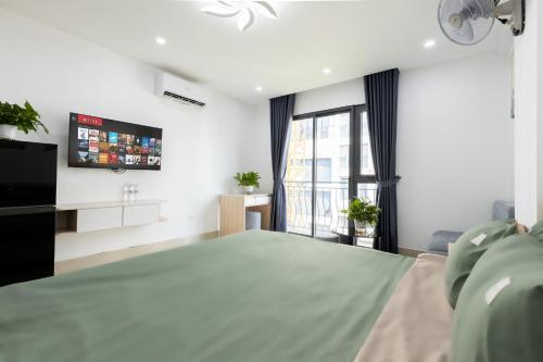 Ένα ή περισσότερα κρεβάτια σε δωμάτιο στο 9 LIGHT APARTMENT