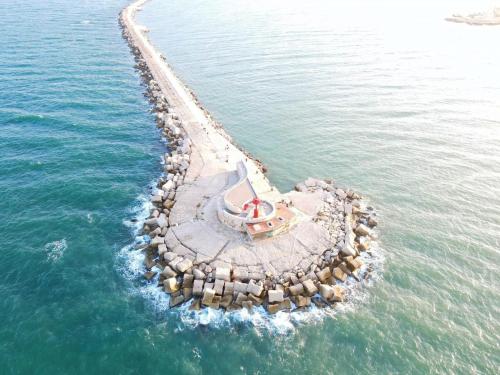 an island in the middle of the water at CD Romanello (Mura S. Cataldo) in Barletta