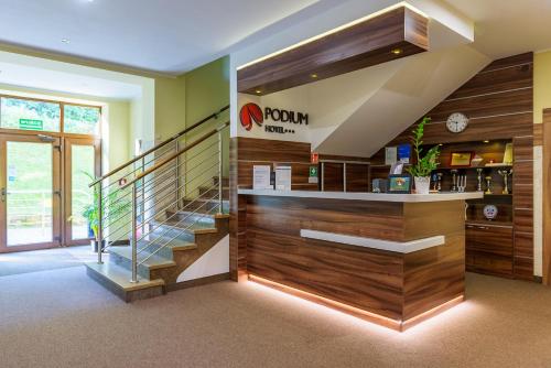 Kuchyň nebo kuchyňský kout v ubytování Hotel Podium