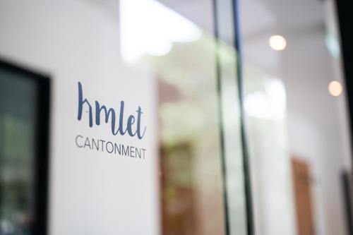 a sign on the side of a building at Habyt Cantonment - formerly Hmlet Cantonment in Singapore