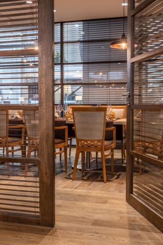 Radisson Blu Hotel & Residencesにあるレストランまたは飲食店
