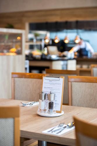 Radisson Blu Hotel & Residencesにあるレストランまたは飲食店