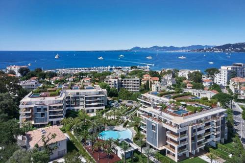an aerial view of a city and the ocean at Luxury garden apartment 2BR in the best development of Cap d'Antibes-Juan les Pins in Antibes