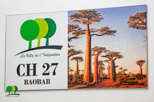a sign with a picture of a tree at VILLA DE L'INTEGRATION in Ouagadougou
