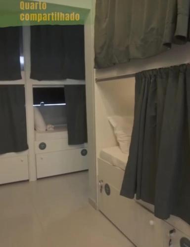 Postel nebo postele na pokoji v ubytování GVR Praia Hostel