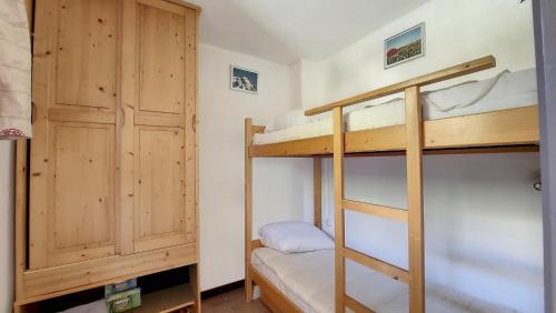Ένα ή περισσότερα κρεβάτια σε δωμάτιο στο Oree de Morzine 32B