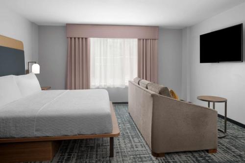 TV a/nebo společenská místnost v ubytování Homewood Suites By Hilton Charlotte Uptown First Ward