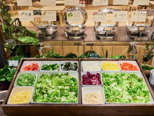 a display of different types of lettuces and vegetables at TOKYO EAST SIDE HOTEL KAIE in Tokyo